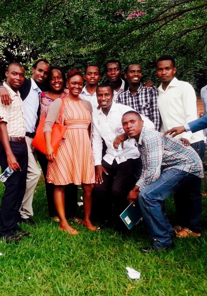 Taking a picture with my colleague and some of our former nursing students from University of Rwanda.