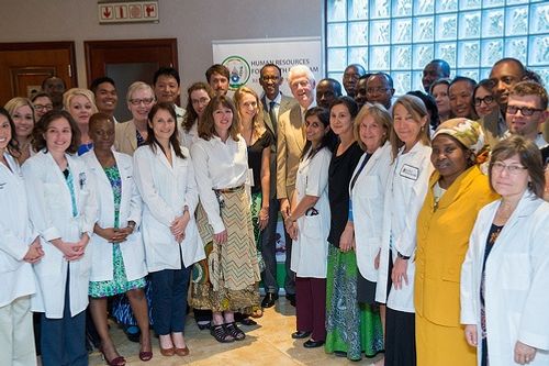 The Rwanda Human Resources for Health (HRH) team meet former president Bill Clinton and the President of Rwanda Paul Kagame in 2013, the second year of the program.